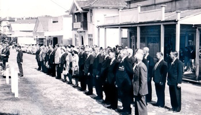 ANZAC Day ceremony in Bowraville during the 1960s with community members gathered