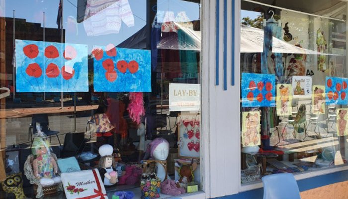 ANZAC Day 2021 window display featuring artwork by Bowraville Central School students